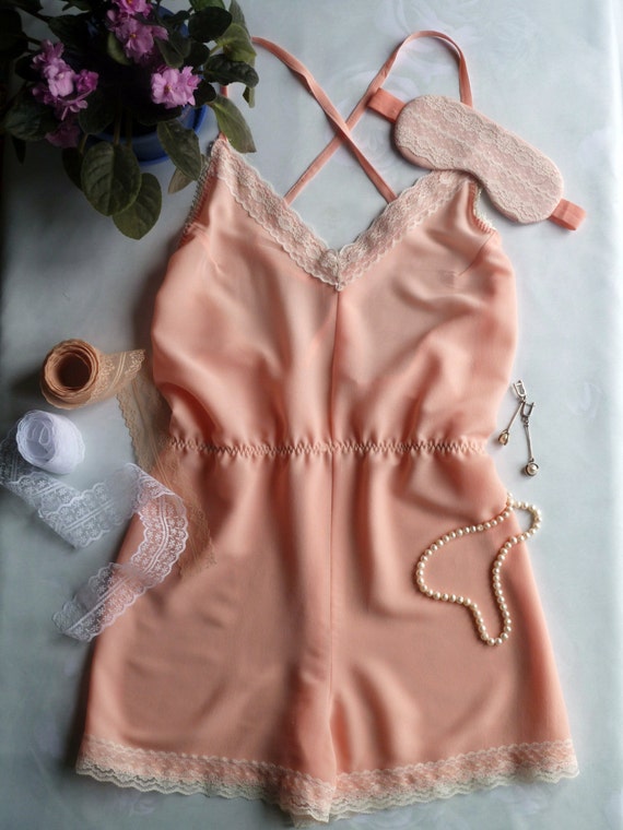 Items similar to Peachy sleep romper on Etsy
