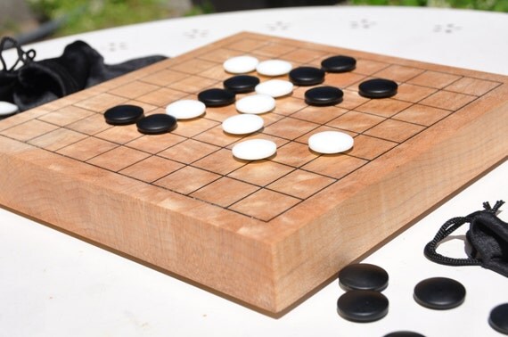 9x9-maple-go-board-with-stones