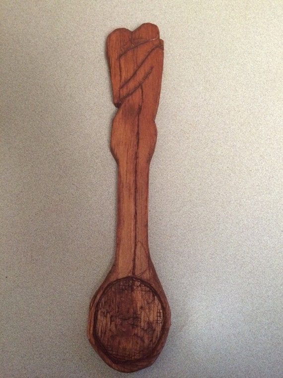 Wooden spoon man and woman embracing by Durfeyswoodcarvings