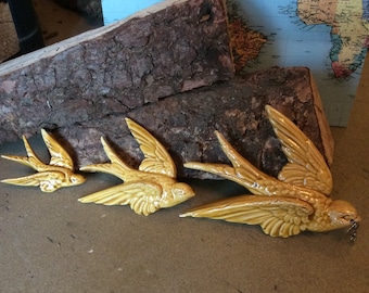 Set of three handmade ceramic birds