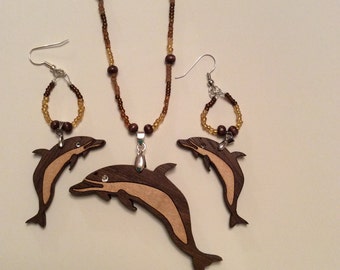 Dolphin pendant necklace and earrings, walnut with maple inlay