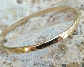 Gold Bangle Bracelet thick and wide with hammered shiny texture. Available in Gold Filled, Rose Gold Filled, 14kt Gold, or 14kt Rose Gold.