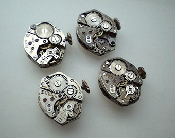 4 vintage steampunk partial watch movements (L36)