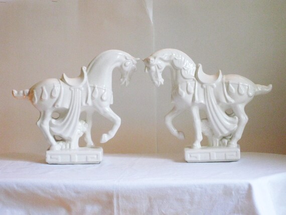 white ceramic horse statue