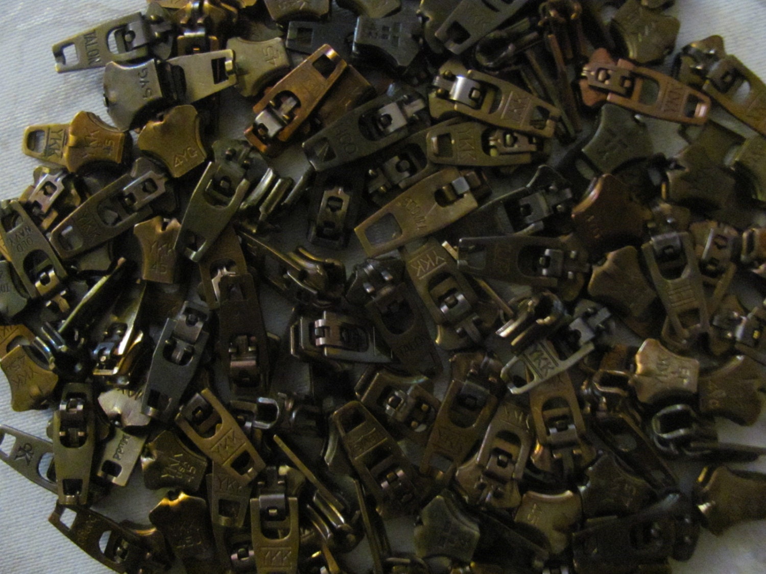 100 zipper heads with pulls