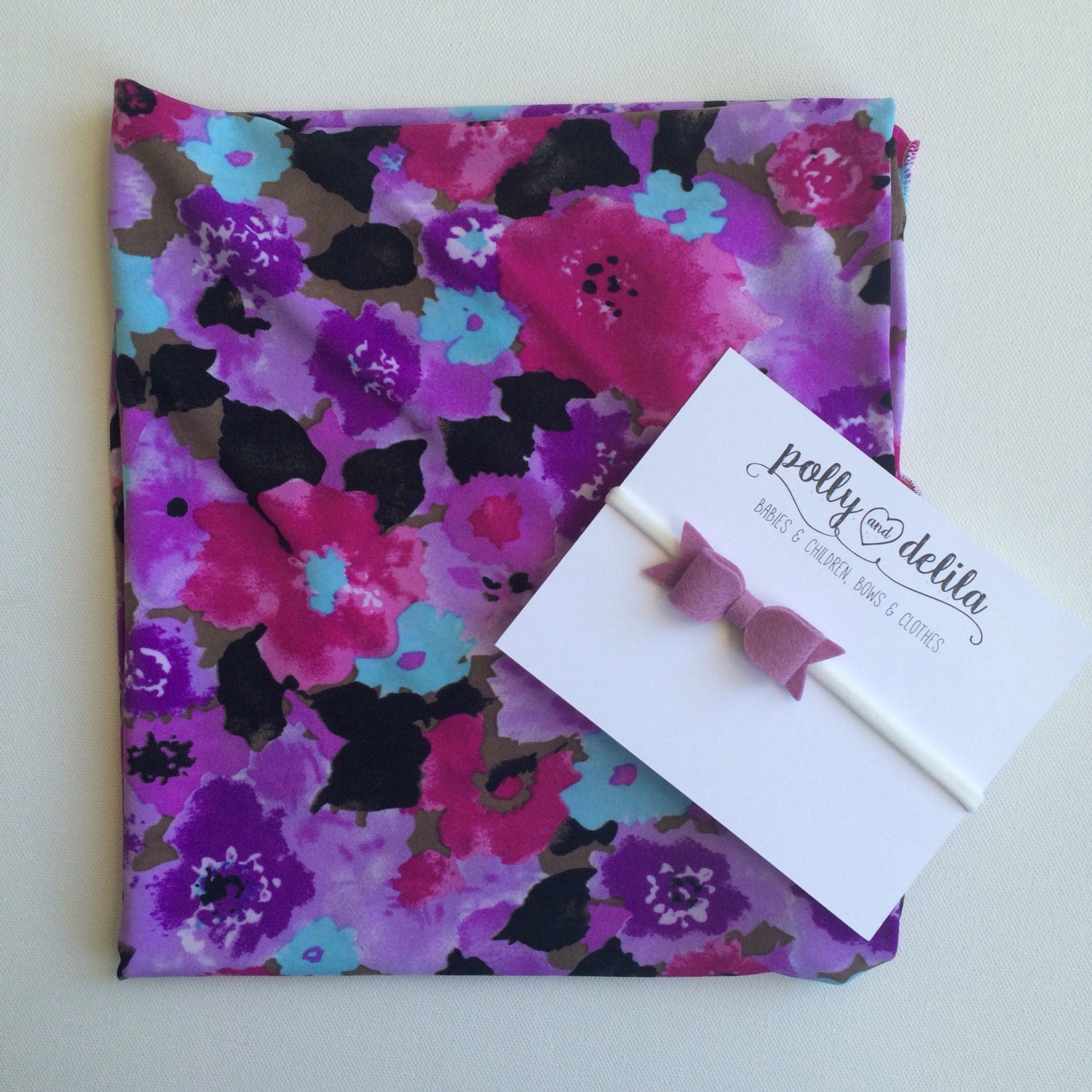 Baby girl swaddle blanket and headband set. Pretty purple and