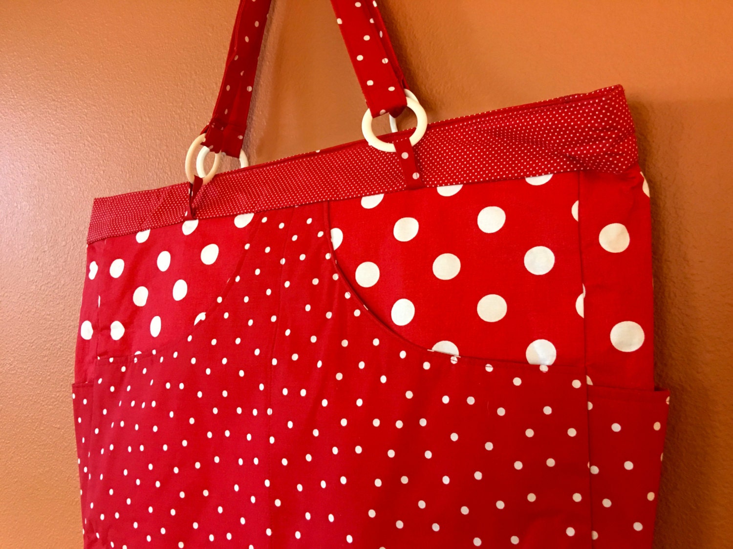 red polka dot bag