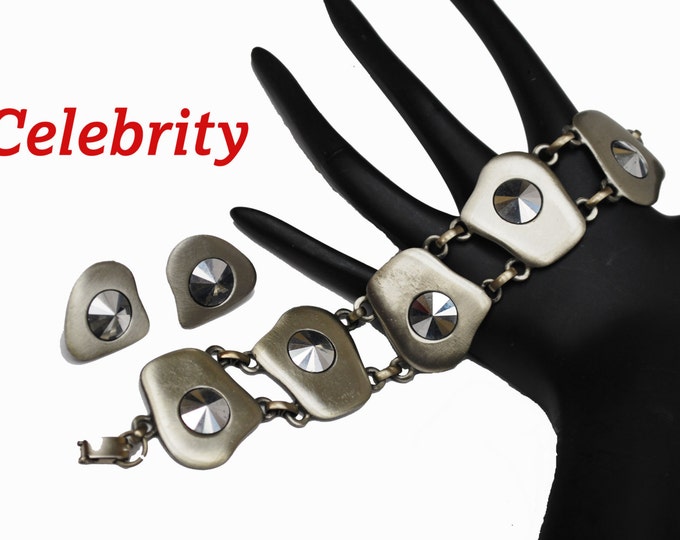 Celebrity Link Bracelet with a gun Metal silver tone modern design and matching clip on earrings