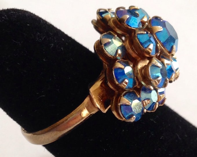 Storewide 25% Off SALE Vintage Gold Tone Iridescent Blue Cluster Rhinestone Designer Cocktail Ring Featuring Prong Set Faceted Design