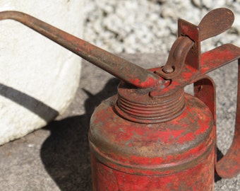 Vintage red oil can
