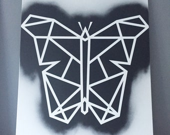Geometric black and white butterfly on canvas
