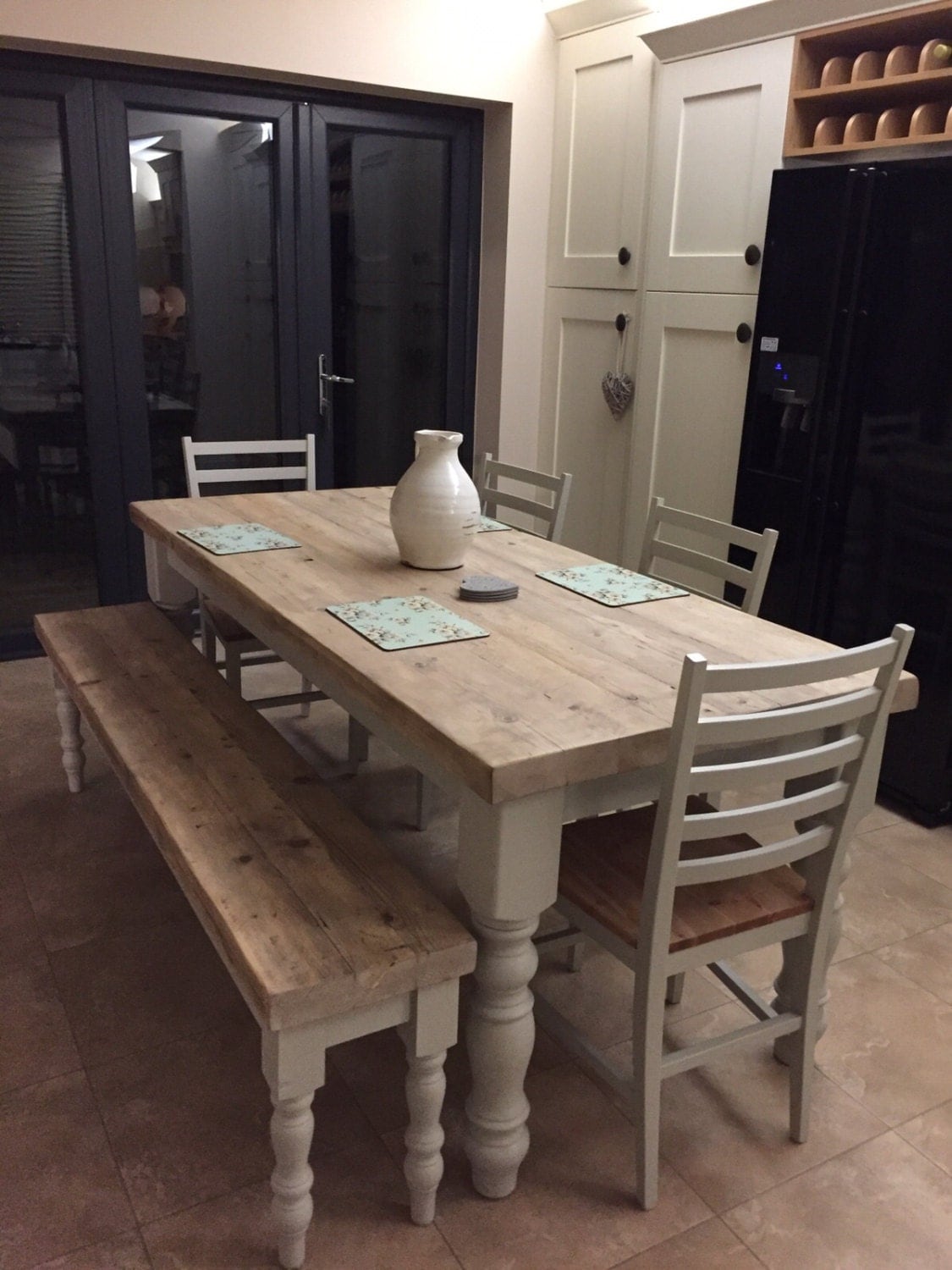 Farmhouse dining table with reclaimed wood top and bench made