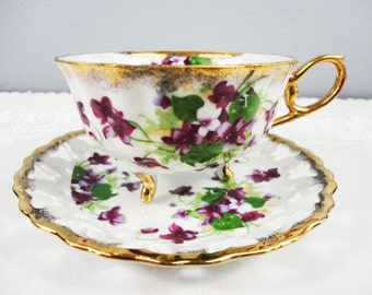LM Royal Halsey Violets Tri-Footed Lusterware Fine China Teacup and Saucer