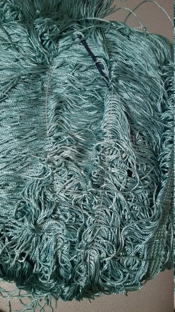 Turquoise 10 fringe fabric sold by the yard