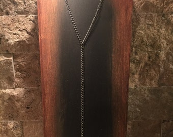 Gunmetal y necklace with a soldered pearl