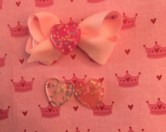 Heart charm with multi-colored stars