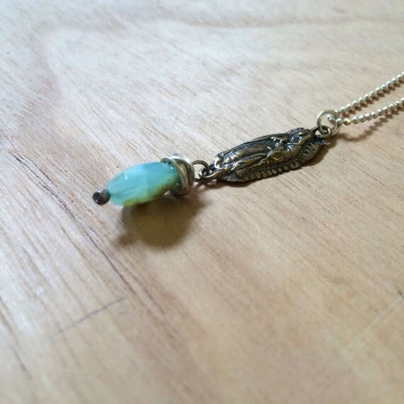 Sterling silver our lady of guadalupe with 'be love' written on back with peruvian opal
