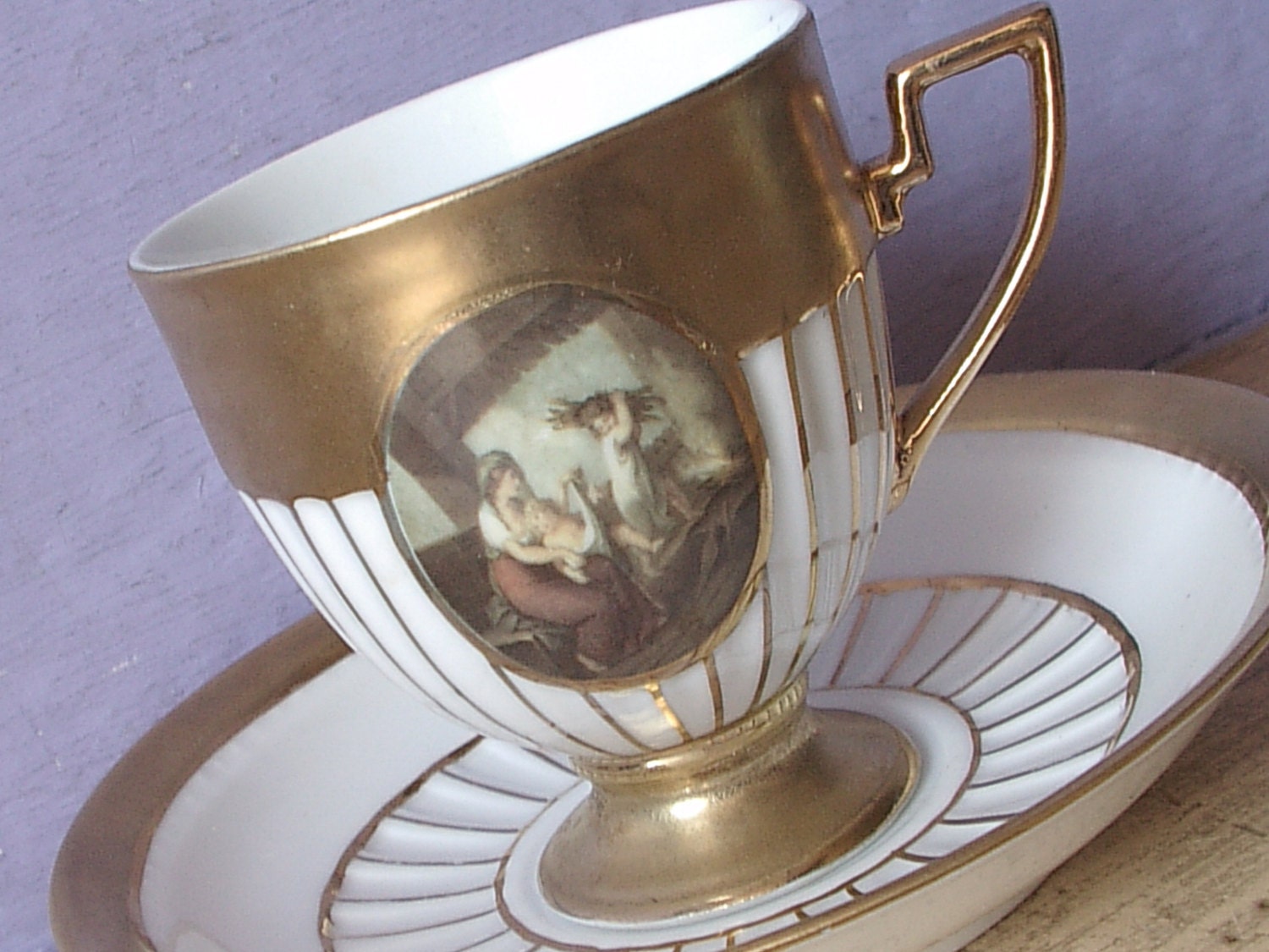 Antique German teacup and saucer Gold tea cup by ShoponSherman