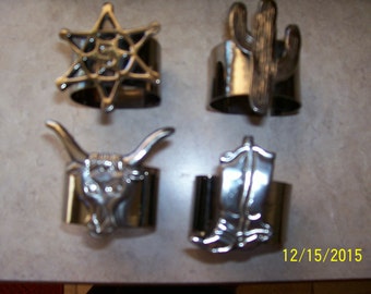 Southwestern napkin rings. set of 4, each different, new