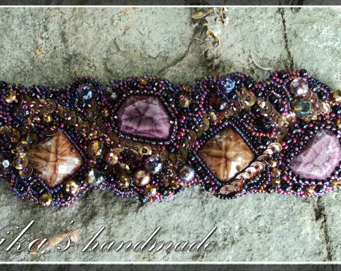 Purple-black beaded bracelet with rhinestones, Czech crystals, sequins and big artificial plastic stones in the Gothic and Fantasy style