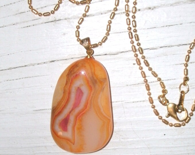 Freeform Lace Agate Necklace - lacey patterns, various shades of yellow orange and red with some white, gold plated Stainless Steel chain