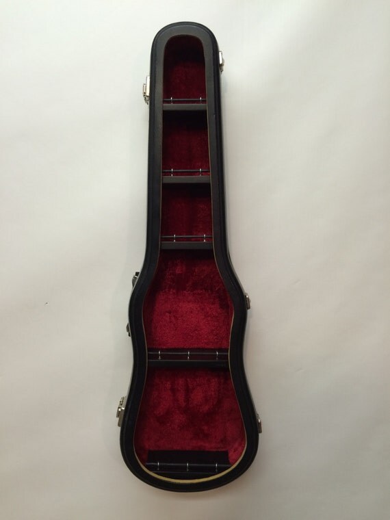 Violin case shelf 1. Recycled hardshell violin case with