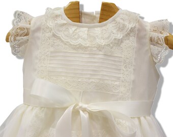 Baptism dress for baby girl made from ivory organza, ivory laces and front sattin bow. Special ocassion like Christening, weddings, birthday