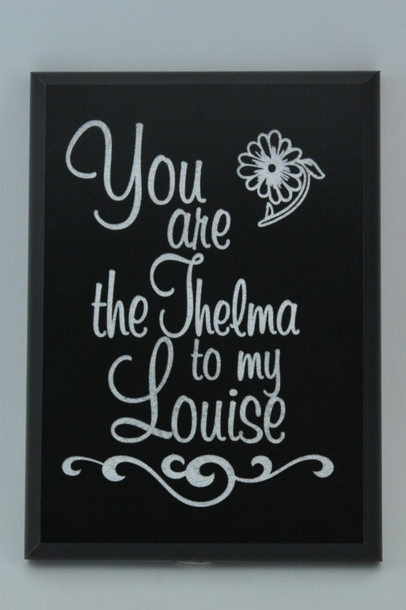 thelma and louise quotes engraved on black wood and filled