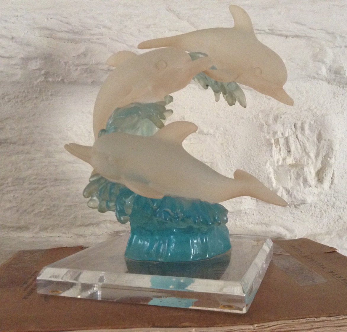 resin dolphin statue