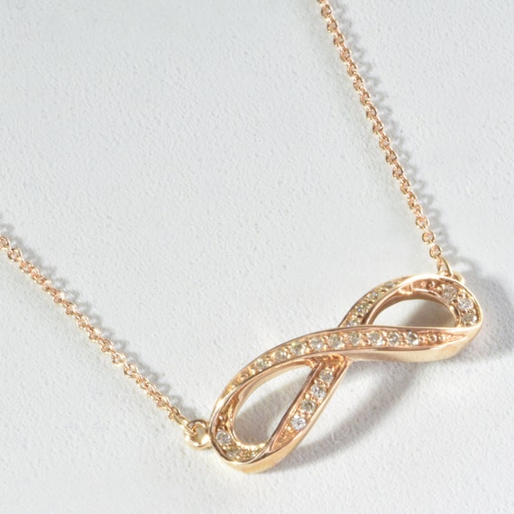 Diamond rose gold infinity necklace
