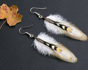 Beige small feather earrings. Lightweight earrings made with small beige natural feathers. Beige, cream and orange colors of the feathers.