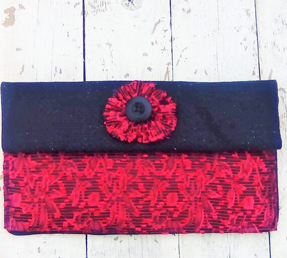 black red clutch bag