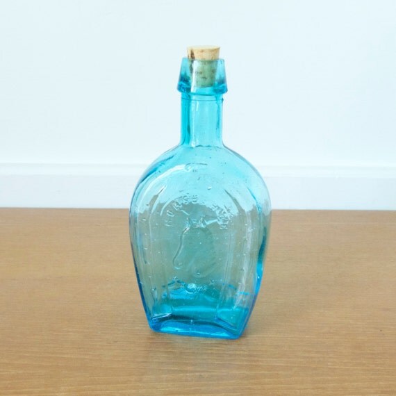 Large blue horseshoe bitters bottle Wheaton bottle
