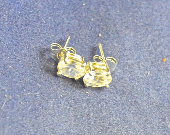 White Zircon Stud Earrings, 7x5mm Oval, Natural, Set in Sterling Silver E919