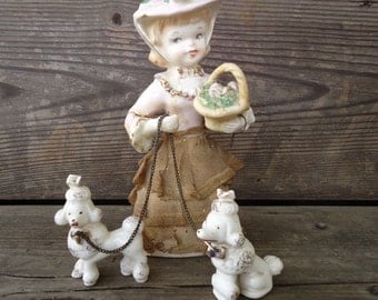Porcelain Girl with Poodles Figurines