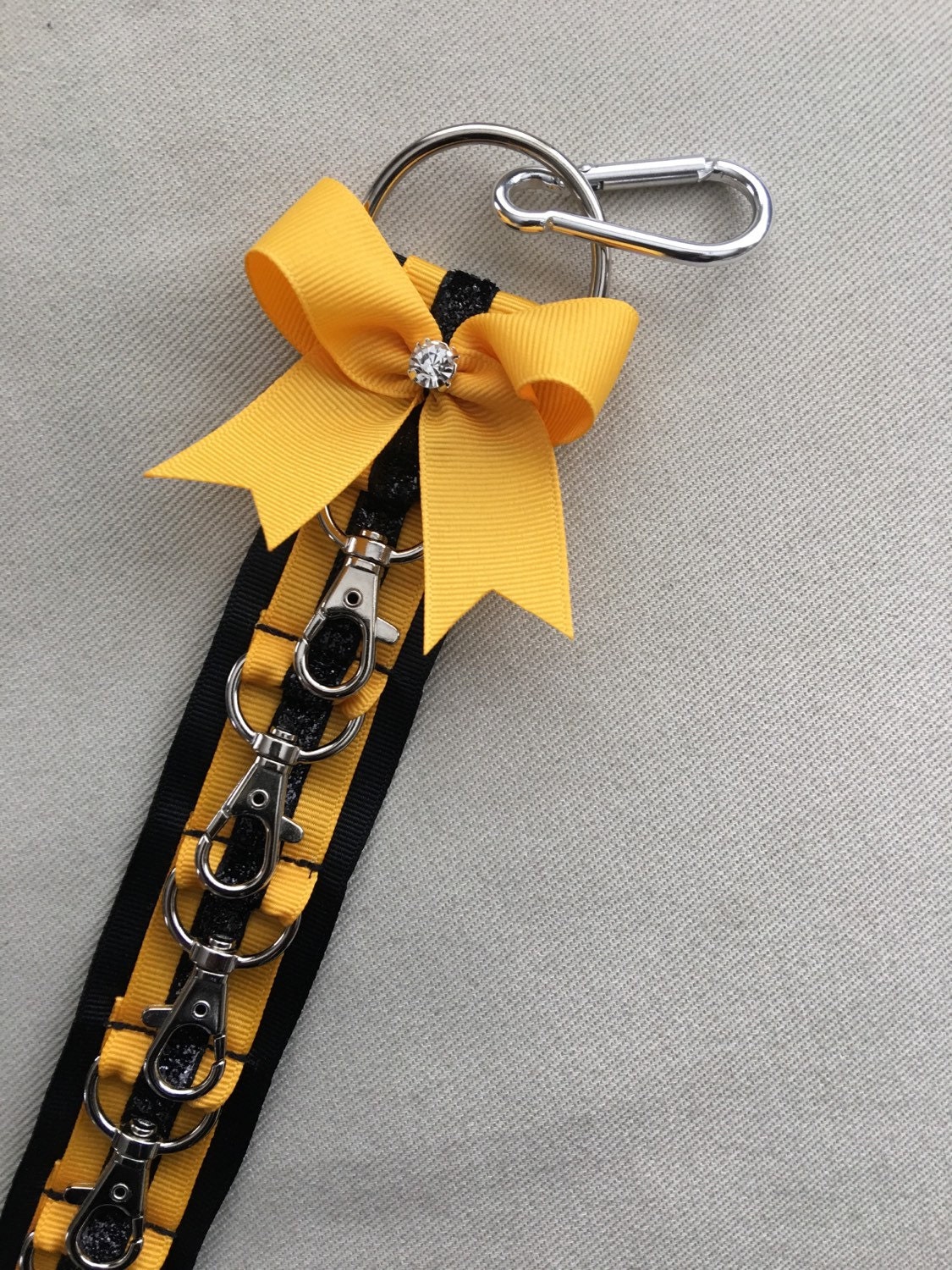 Cheer Bow Holder / Klinger™ Backpack Strap. Orange by