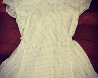 Lovely white cotton flutter sleeved dress.