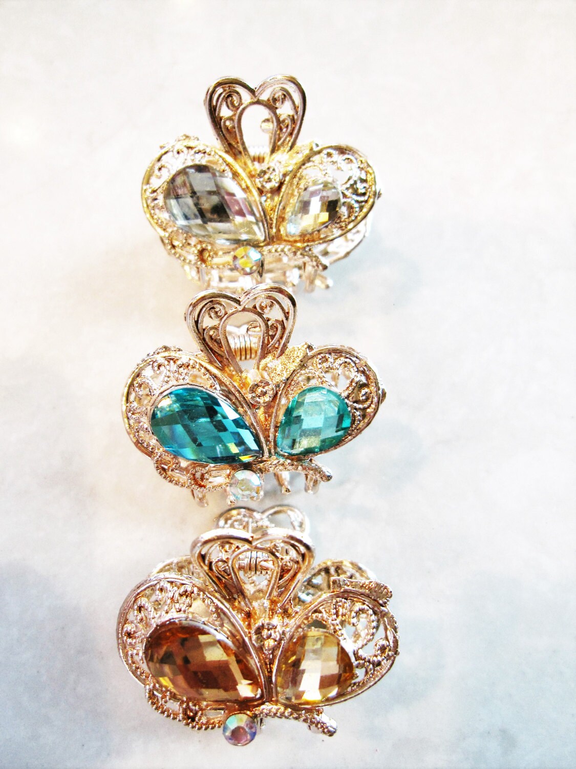 Jeweled antique gold hair claw clip with crystals