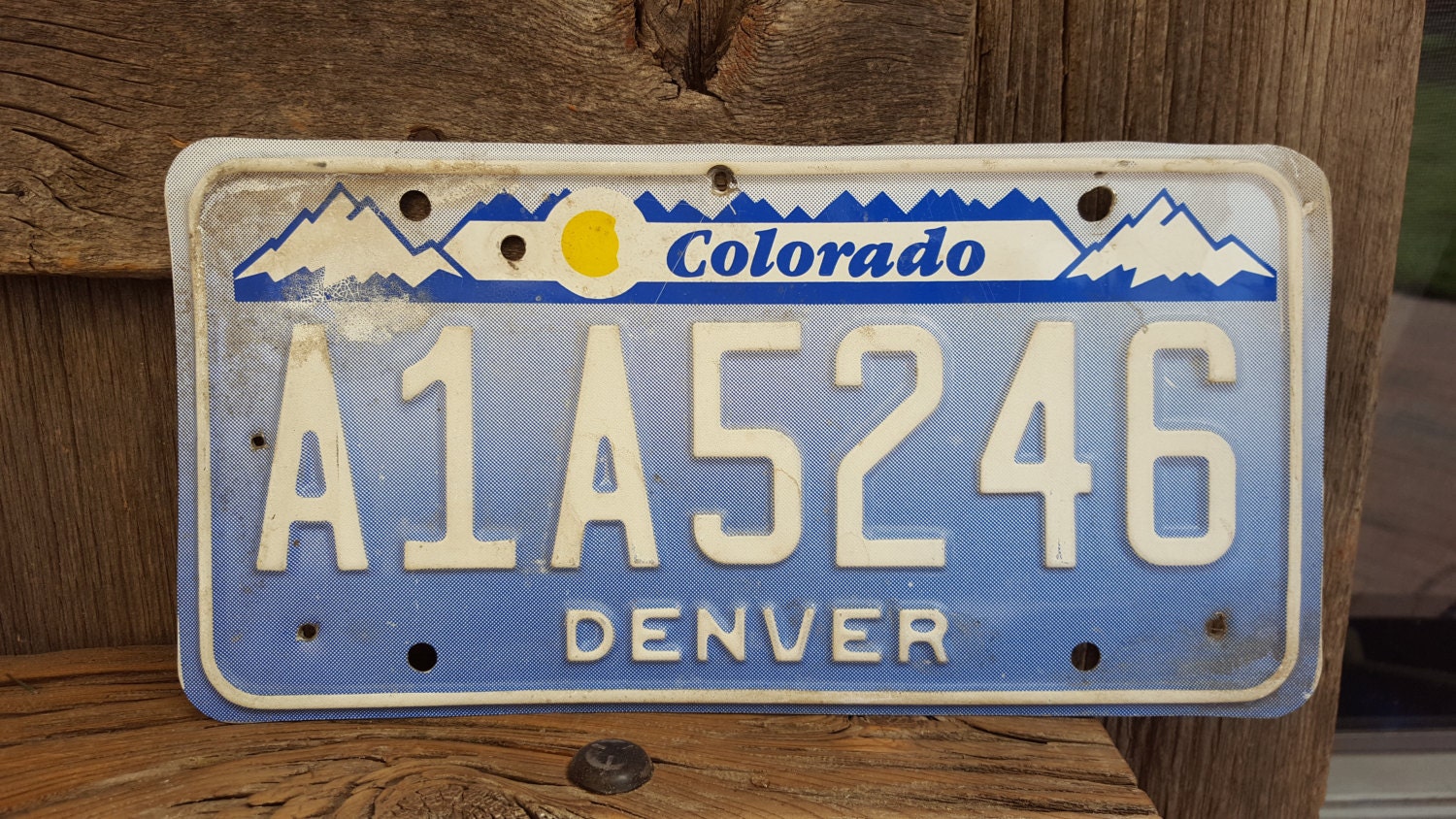 Denver License Plate Number A1A5246 in Blue and by AmericanAntique