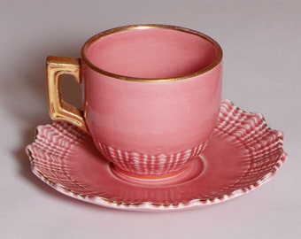 German scalloped demitasse cup and saucer, pink with gold trim