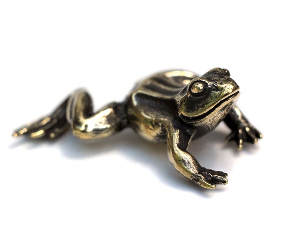 antique frog statuette