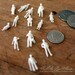 13 miniature human figures - white - 1:100 scale