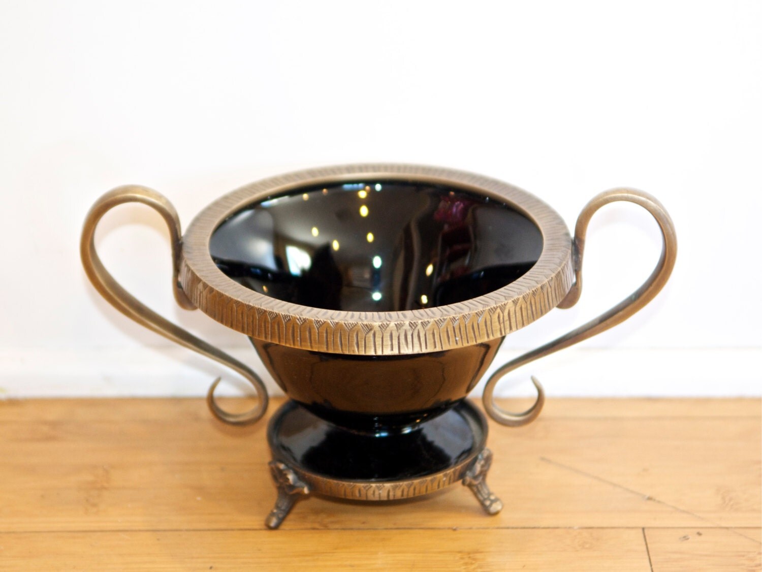 Vintage black glass bowl with brass accentsbrass handles and