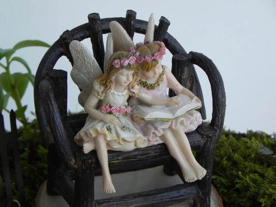 garden fairy reading book statue