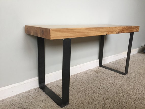 Wooden blonde entryway bench with black wrought iron legs