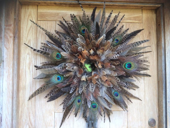 Pheasant feather wreath/wall decor with peacock feathers