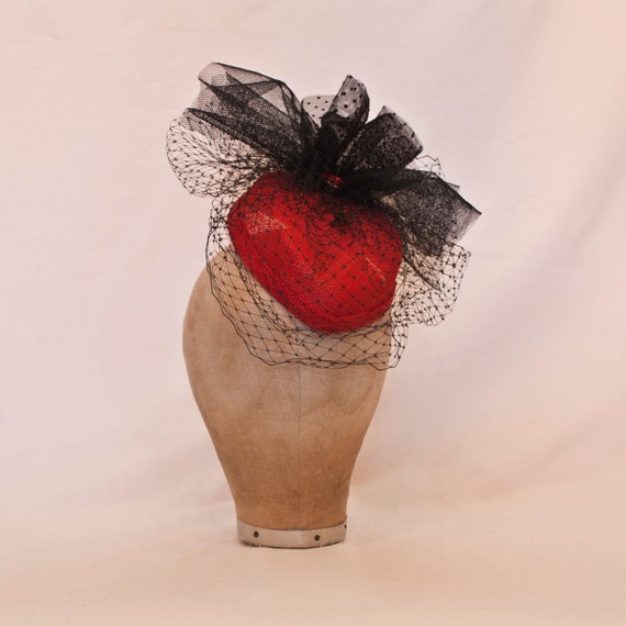Handmade heart shaped fascinator decorated with black net and tulle