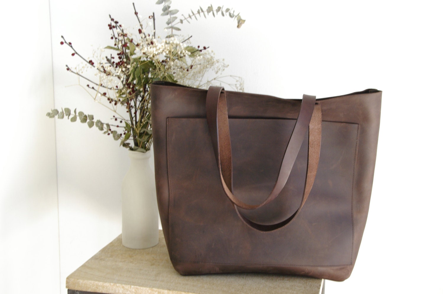 Larger Dark Brown Leather tote bag with big outside pocket.
