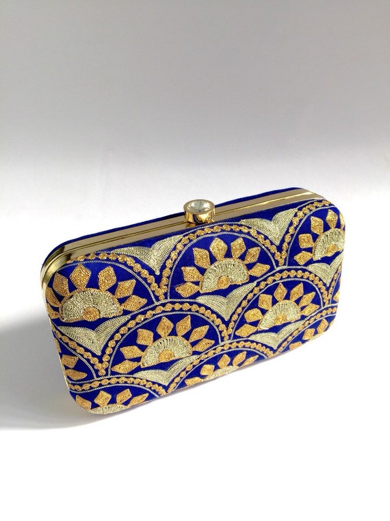 gold and blue clutch