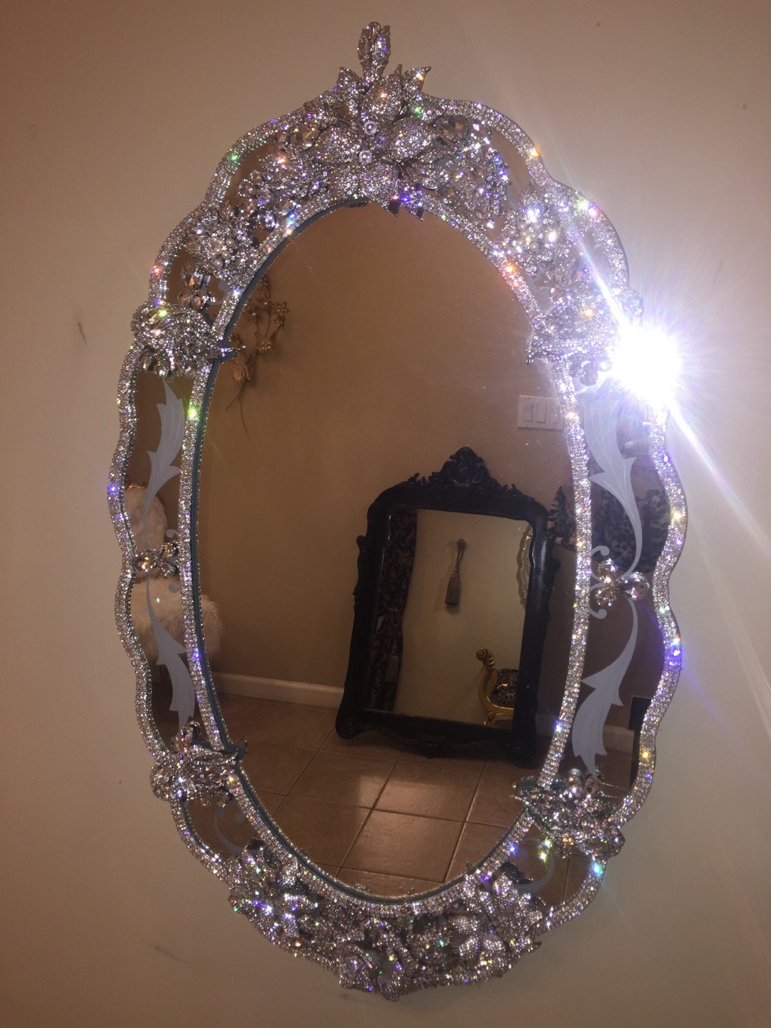 Rhinestone encrusted wall mirror